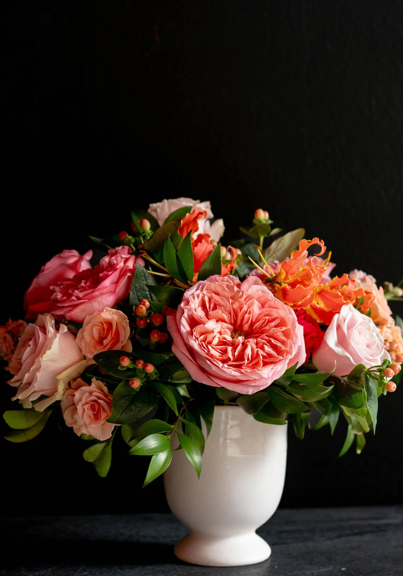 Bouquet of seasonal blooms in a white vase, representing Monthly Flower Subscription (Copy). Beautiful and vibrant arrangements.
